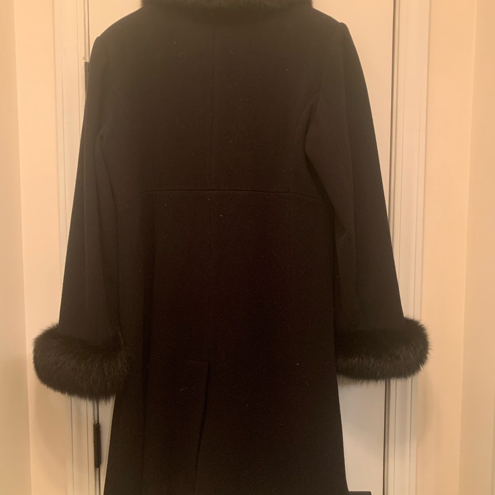 Black, fur around the collar and wrist
